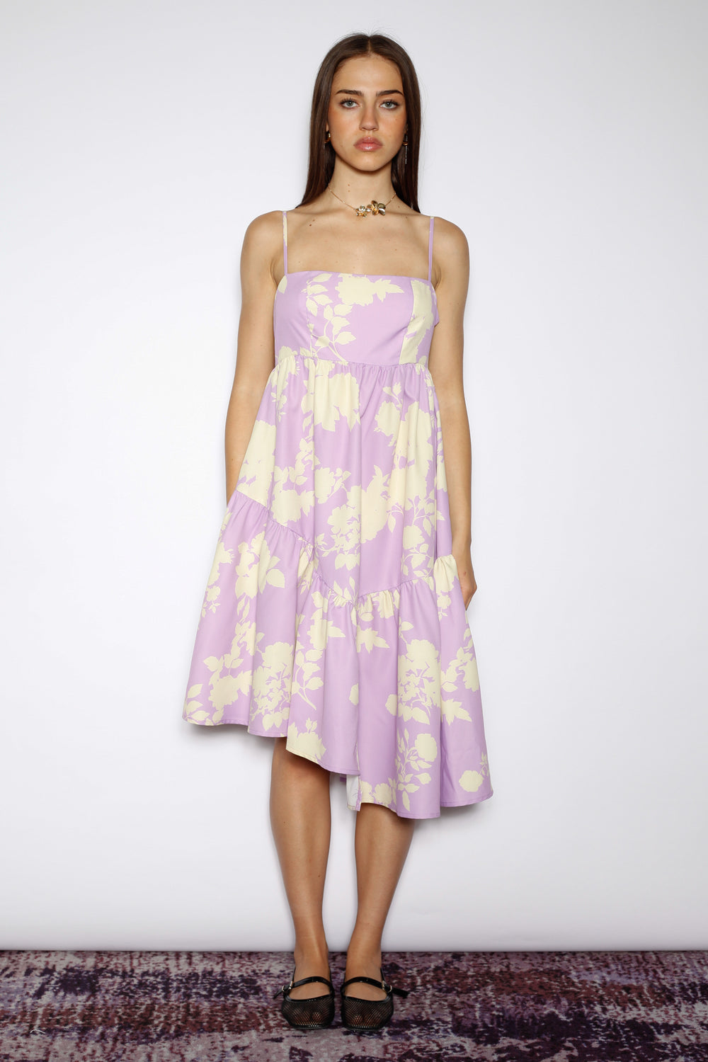 purple snow floral dress Ava Presley 47145 Long Print Ball Gown Ruffle Prom The dress features a beautiful pink floral pattern that adds a delicate touch Floral Beauty Maxi Dress -
