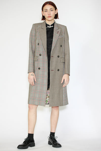 Abrigo con doble botonadura y collage de cuadros de lana