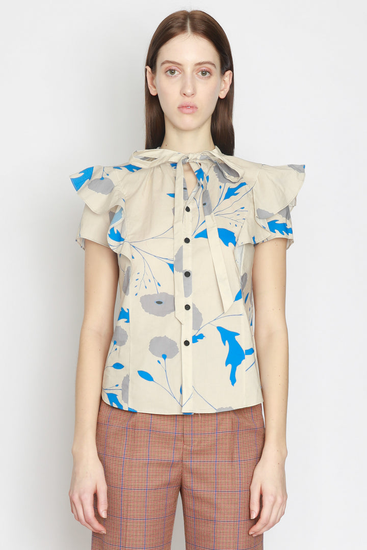 Blusa con estampado floral en beige