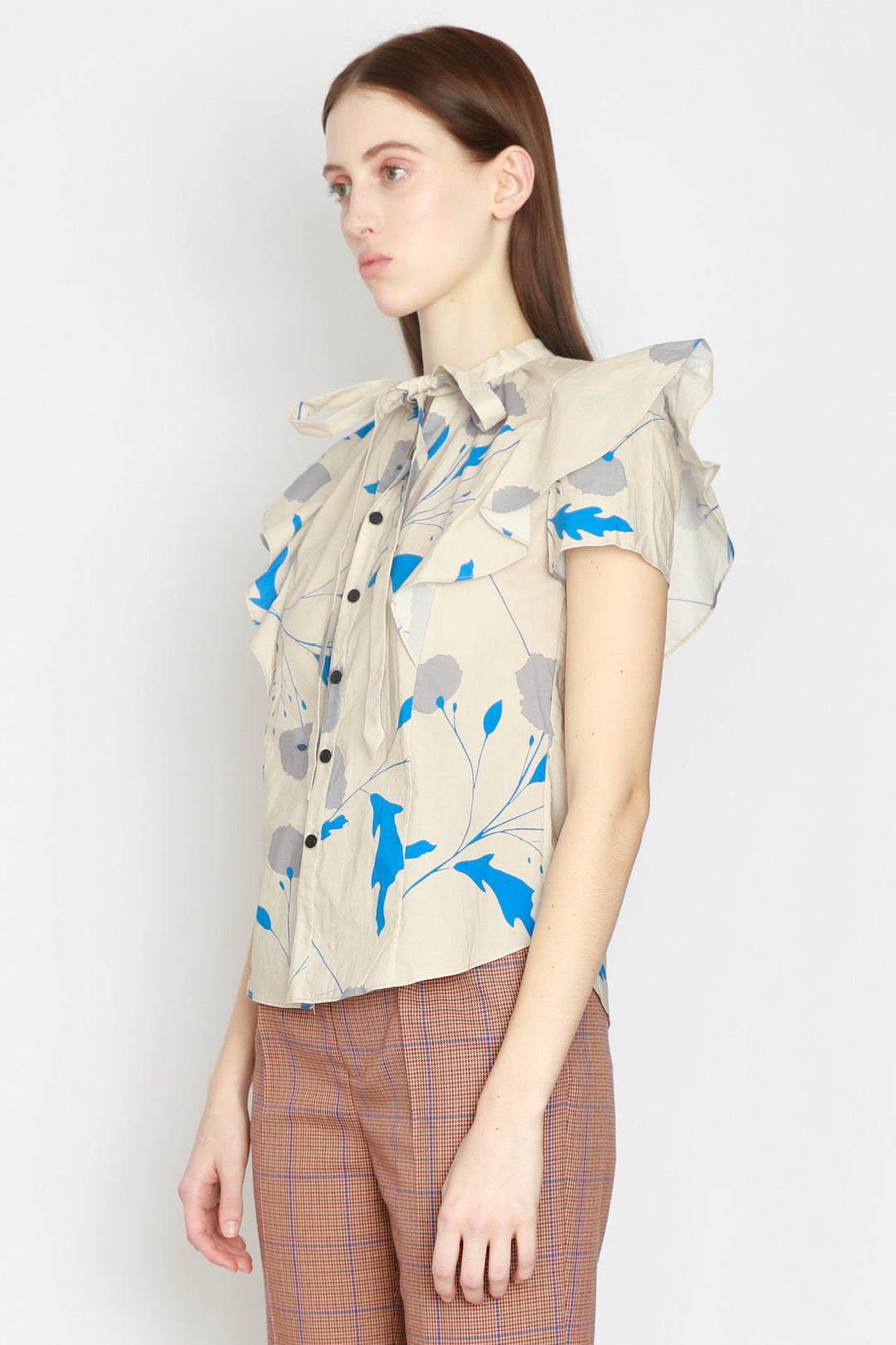 Blusa con estampado floral en beige